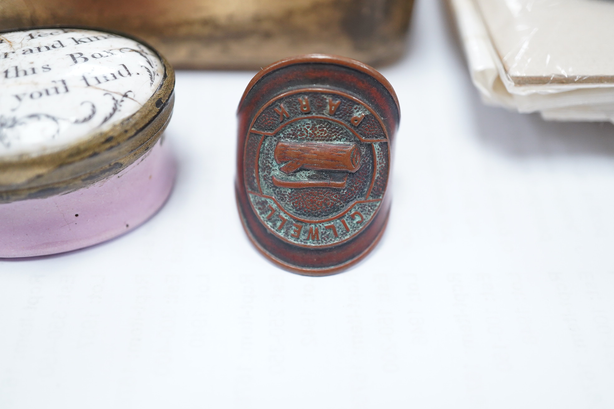 An 18th century enamel patch box with motto and four Italian Grand tour style micro-mosaic panels, housed in a 1914 Christmas tin. Condition - fair